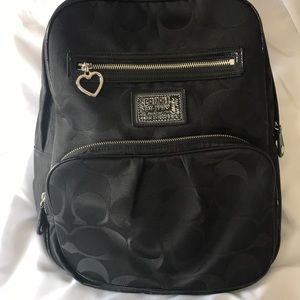 Gently used Black COACH backpack